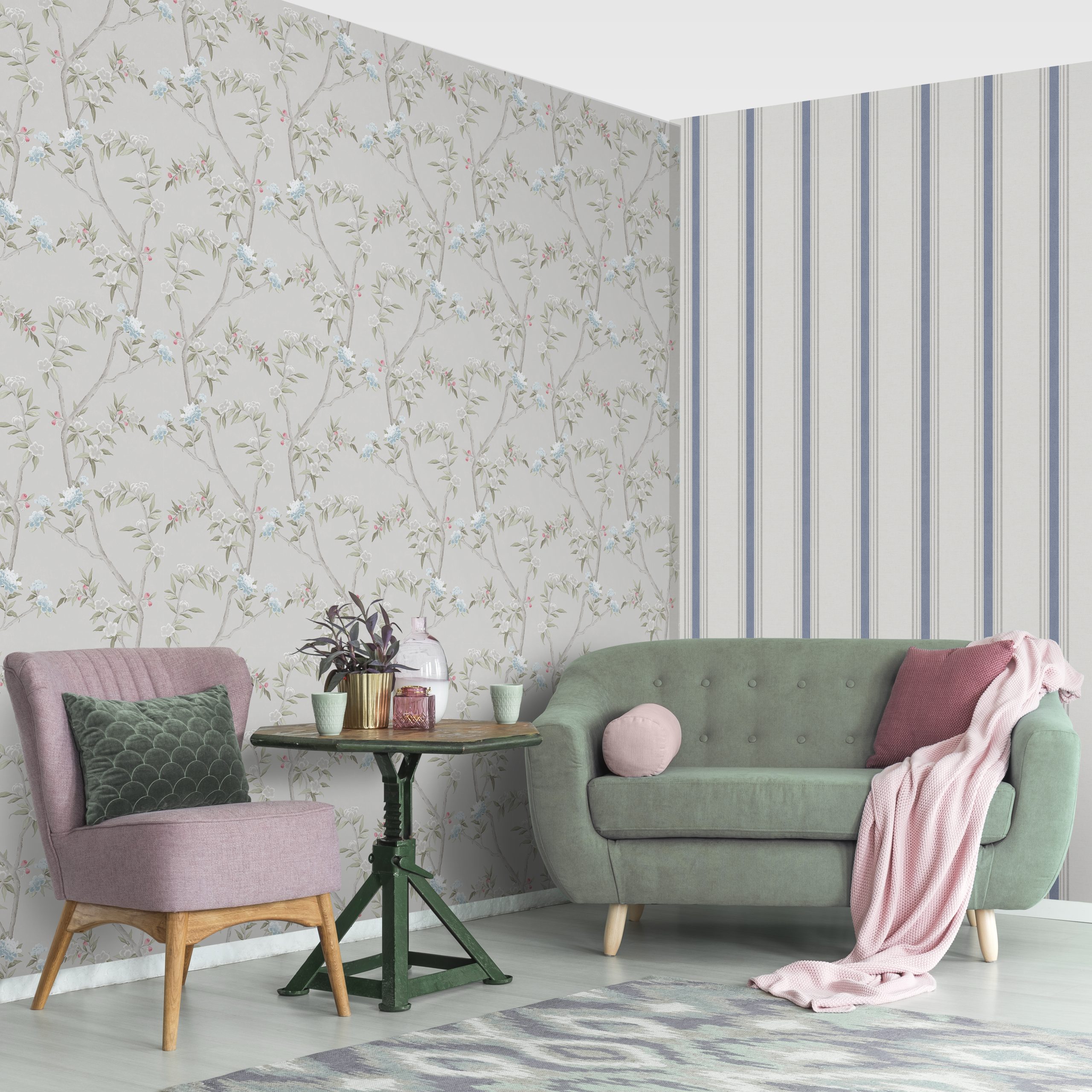 Green,Table,With,A,Plant,Between,Pink,Chair,And,Blue