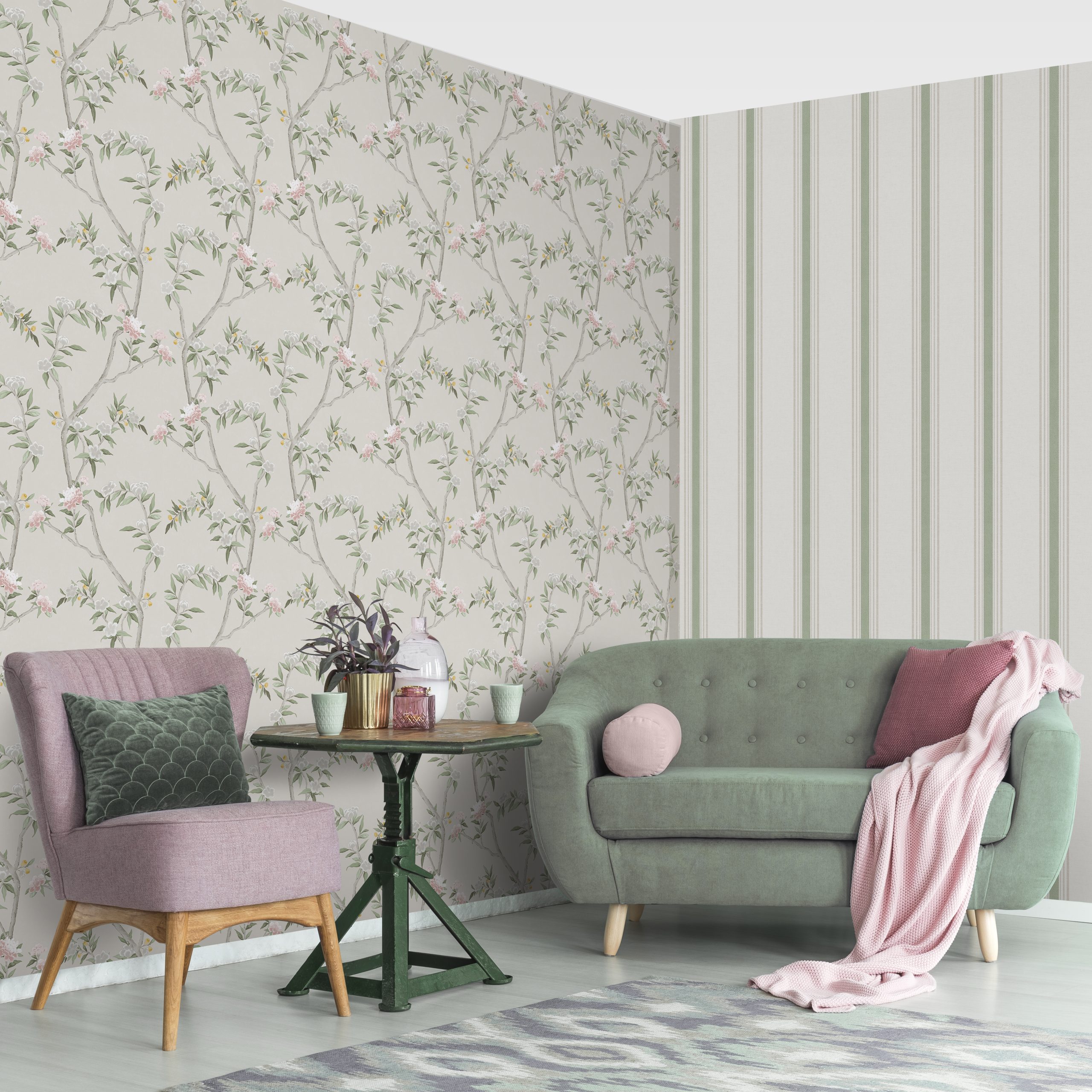 Green,Table,With,A,Plant,Between,Pink,Chair,And,Blue